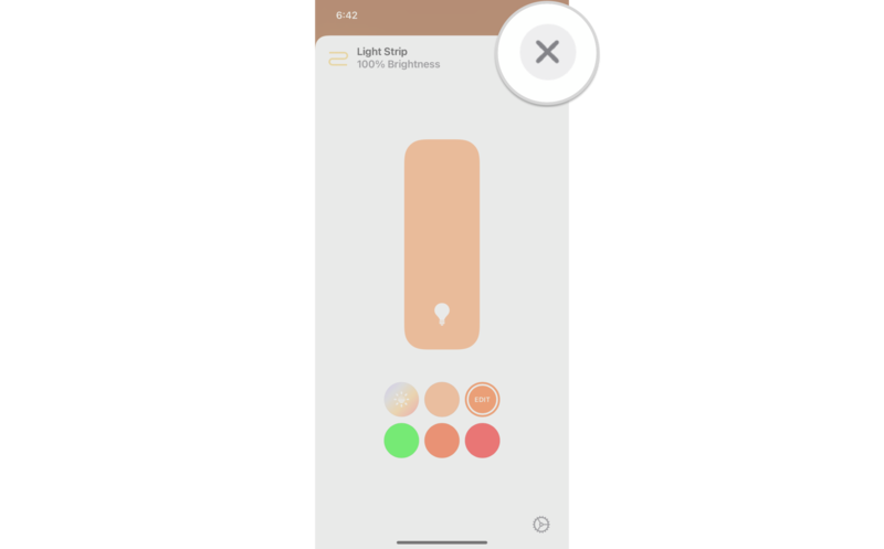How to set the color temperature for HomeKit lights in the Home app on the iPhone, showing the steps: Touch the X button to save the selection