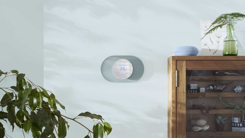 Nest thermostat in the fog installed on the wall